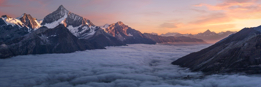 A vast mountain landscape stretching toward the horizon
